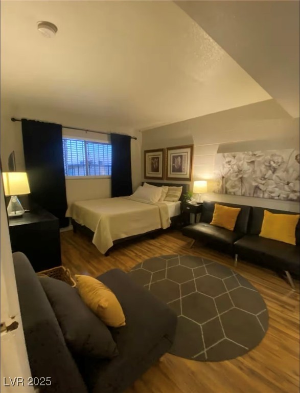 615 South Royal Crest Circle, Unit 8 Las Vegas, NV 89169 - Photo 2 of 11 Bedroom featuring wood finished floors