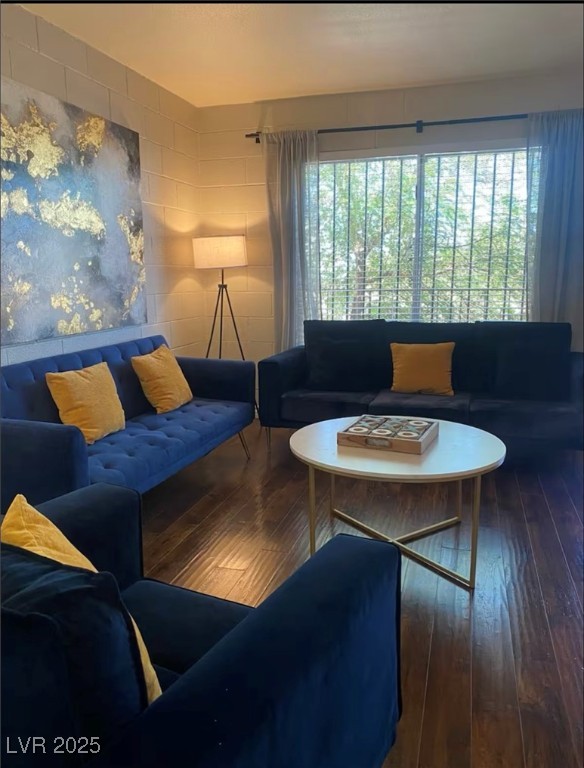 615 South Royal Crest Circle, Unit 8 Las Vegas, NV 89169 - Photo 5 of 11 Living area featuring hardwood / wood-style floors