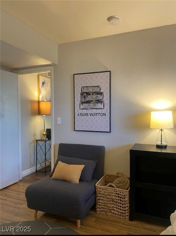 615 South Royal Crest Circle, Unit 8 Las Vegas, NV 89169 - Photo 9 of 11 Sitting room featuring wood finished floors