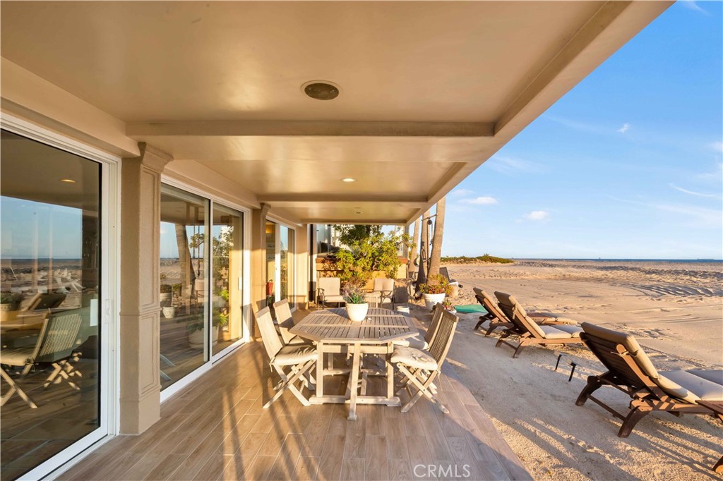 67 Surfside Avenue Surfside, CA 92649 - Photo 11 of 61 Covered patio on the sand