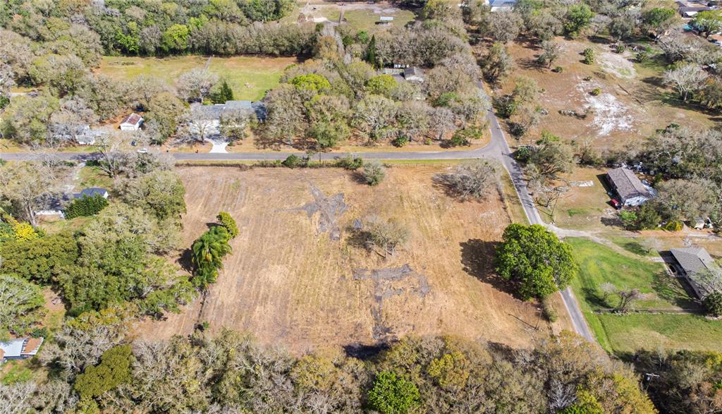 1206 Fisher Lane Brandon, FL 33510 - Photo 12 of 22 a view of a lake with top of house