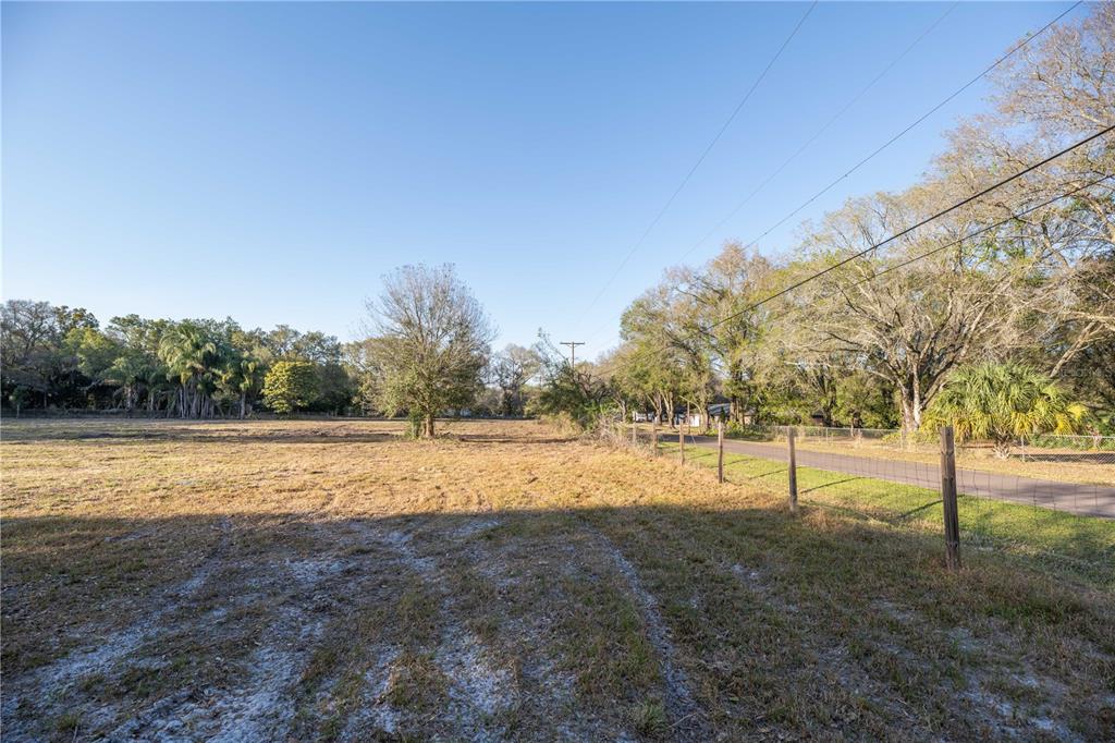 1206 Fisher Lane Brandon, FL 33510 - Photo 6 of 22 a view of an outdoor space with yard