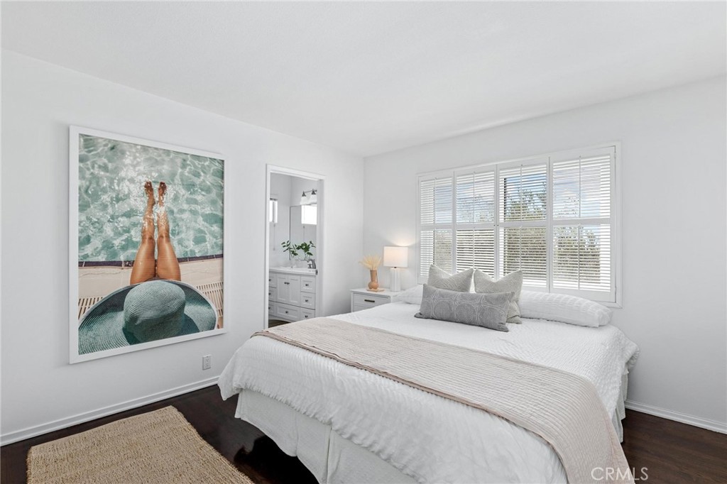 224 18th Street Manhattan Beach, CA 90266 - Photo 16 of 63 a bedroom with a large bed and a window