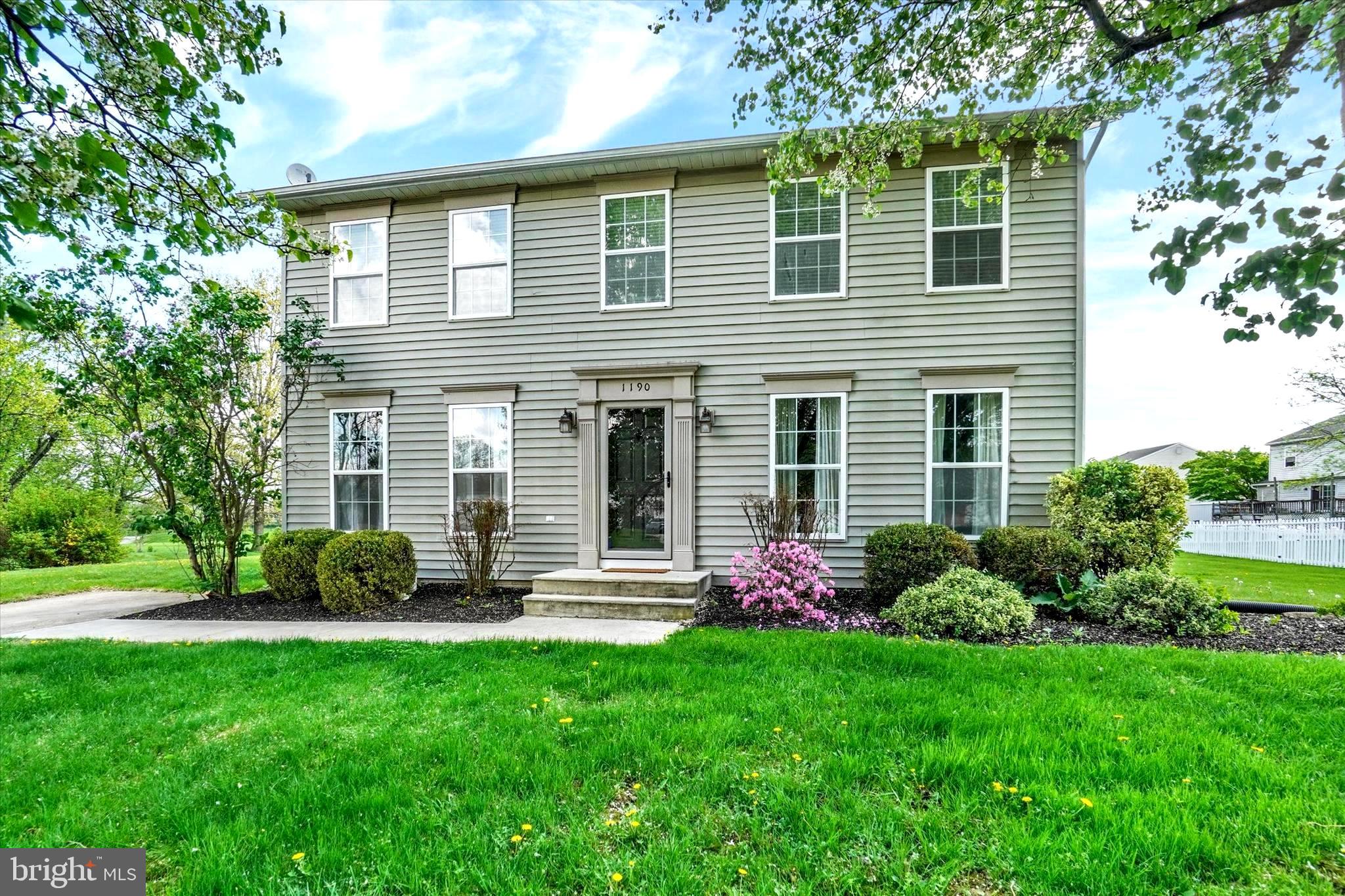 1190 Cherimoya Street York, PA 17404 - Photo 1 of 33 a front view of a house with garden