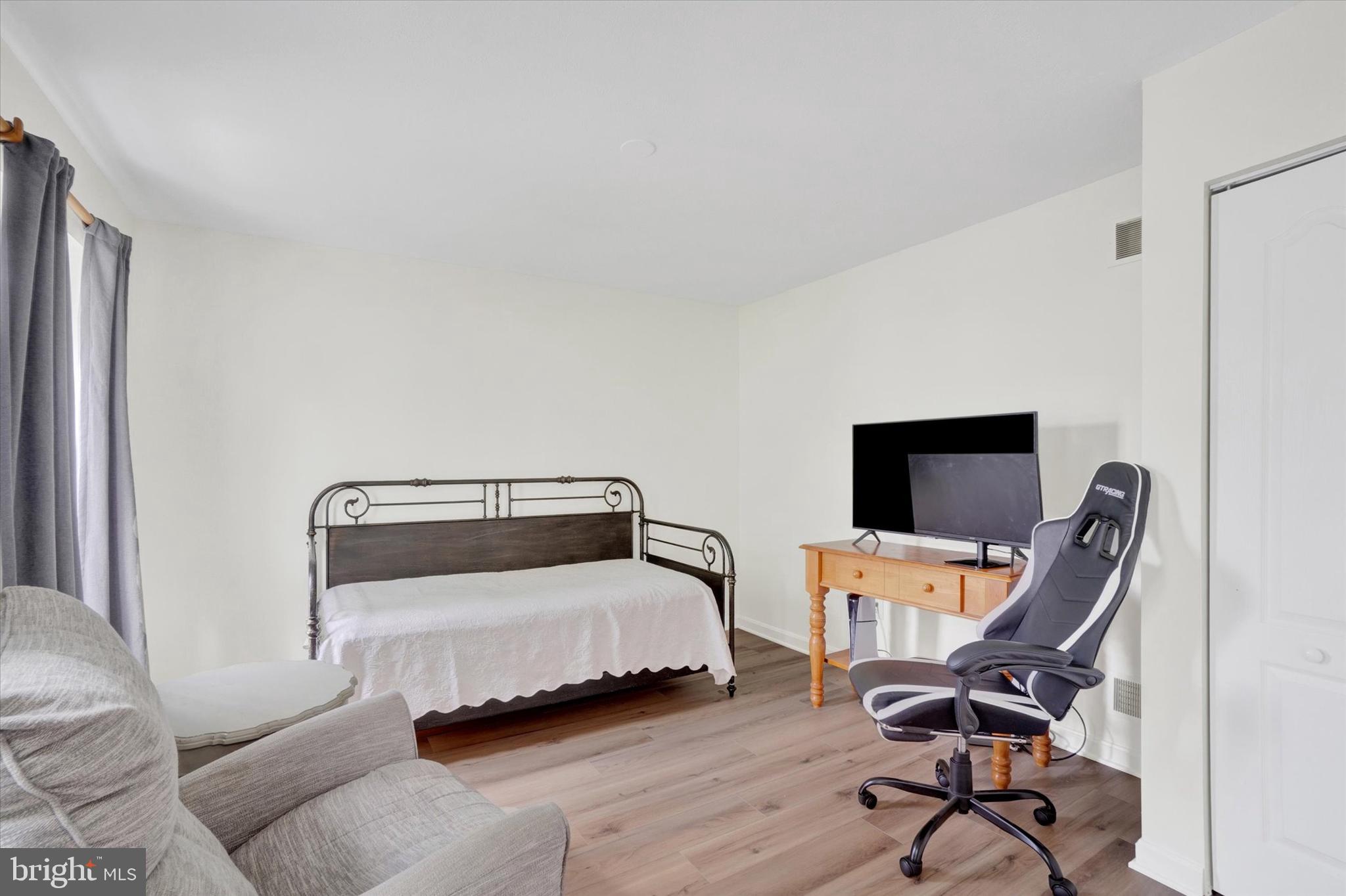 1190 Cherimoya Street York, PA 17404 - Photo 11 of 33 a bedroom with a bed and a desk