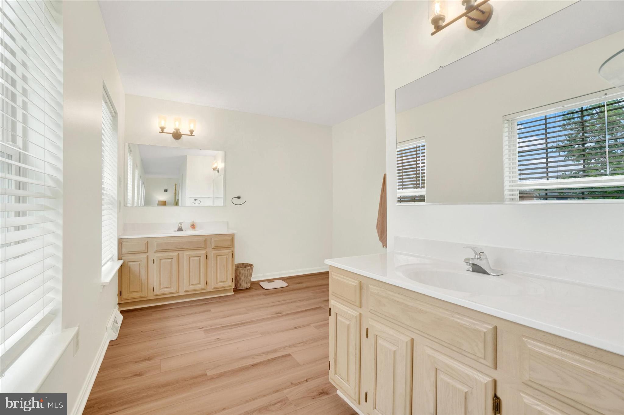 1190 Cherimoya Street York, PA 17404 - Photo 24 of 33 a spacious bathroom with a sink a mirror and a bathtub