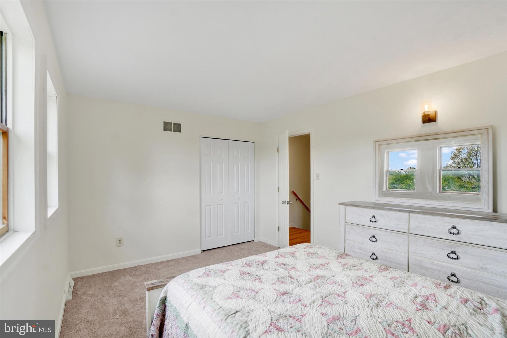 1190 Cherimoya Street York, PA 17404 - Photo 28 of 33 a view of a bedroom with wooden floor and cabinet