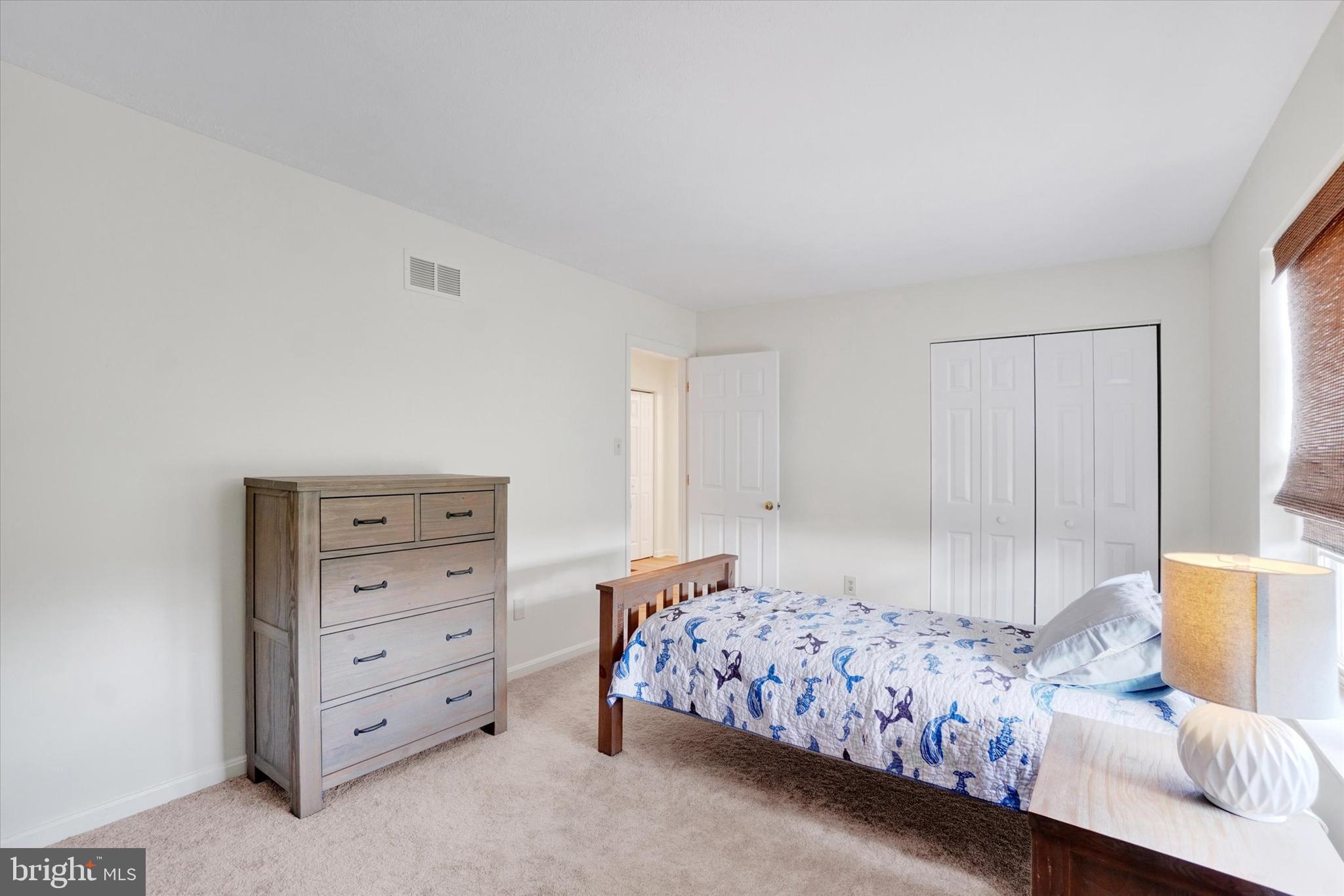 1190 Cherimoya Street York, PA 17404 - Photo 30 of 33 a bedroom with a bed and a couch