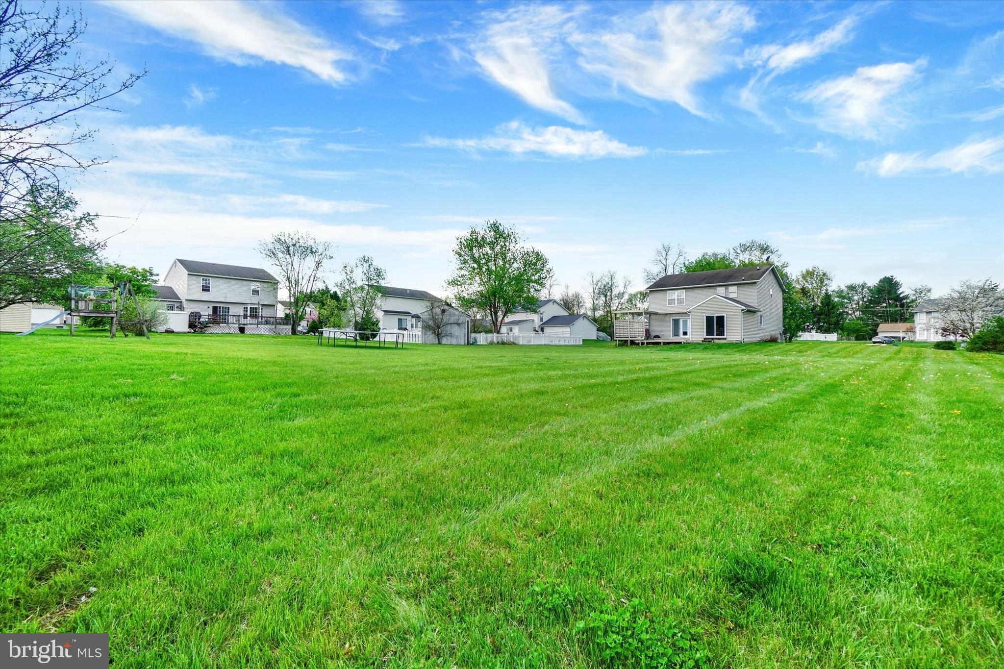 1190 Cherimoya Street York, PA 17404 - Photo 4 of 33 a view of a house with a big yard
