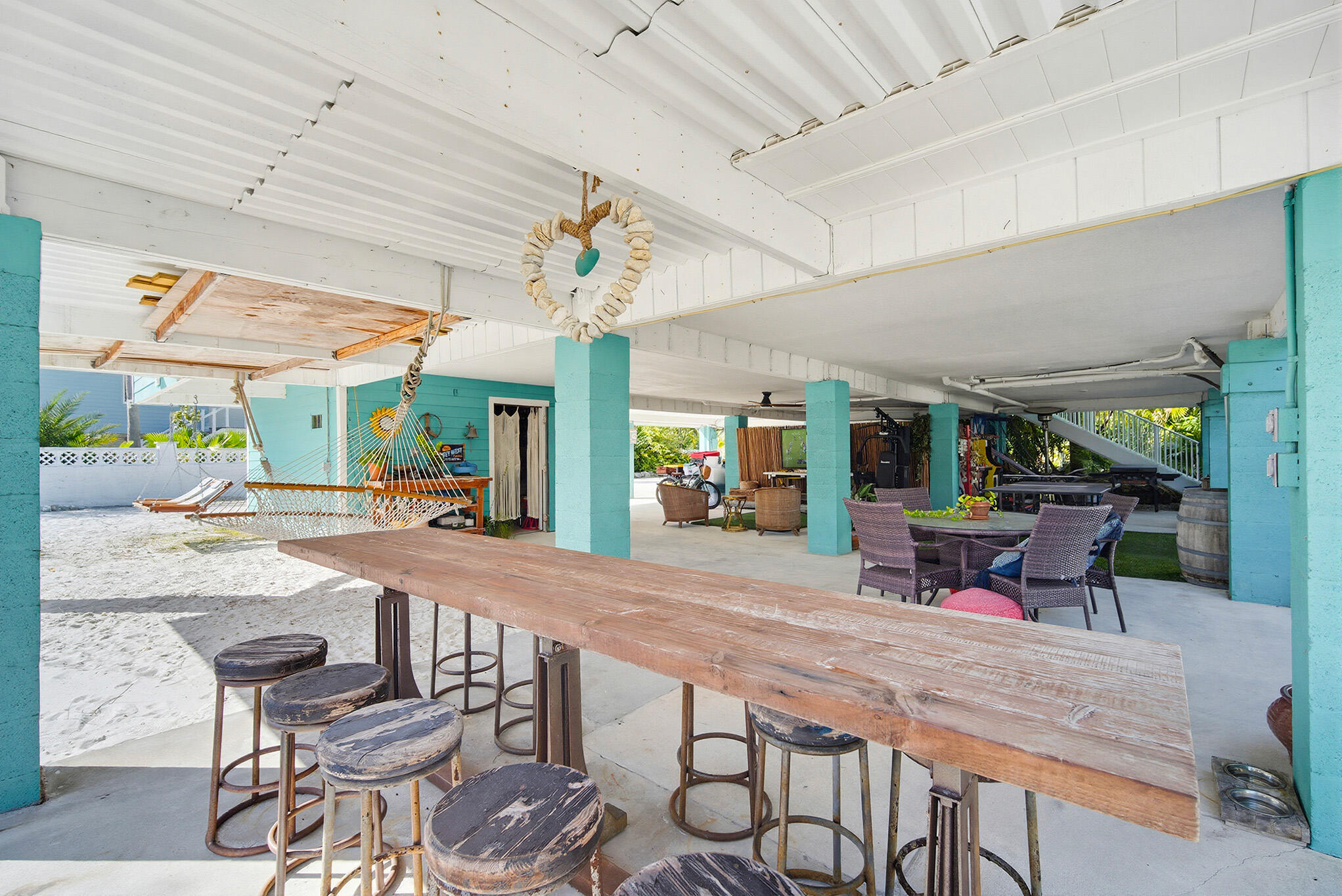 16640 Cypress Road Sugarloaf, FL 33042 - Photo 23 of 86 a view of a patio with a table and chairs