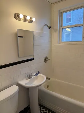 a bathroom with a bathtub