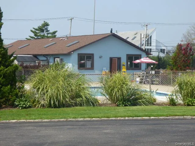 a house view with a garden space