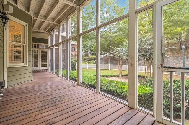 a bathroom with a bathtub and shower
