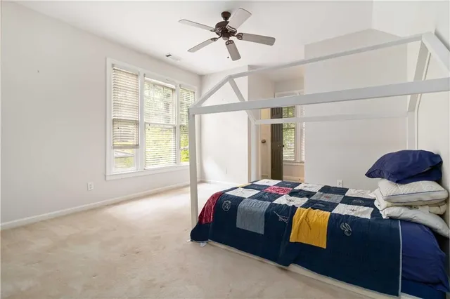 a view of an empty room with stairs