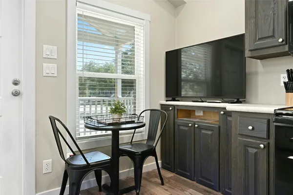 a kitchen with a refrigerator stove and microwave