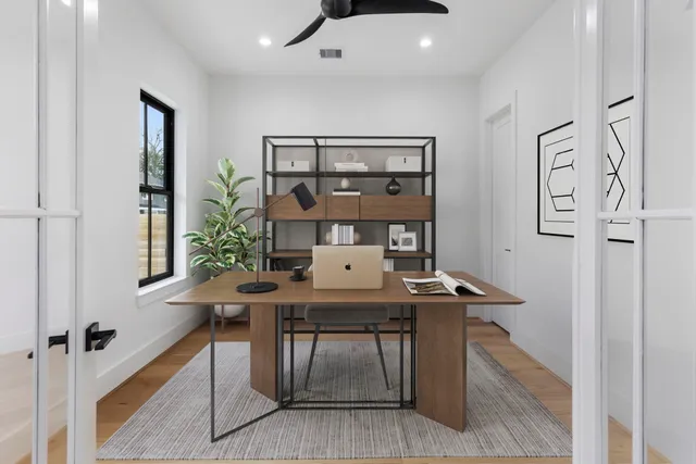 a workspace with furniture and window
