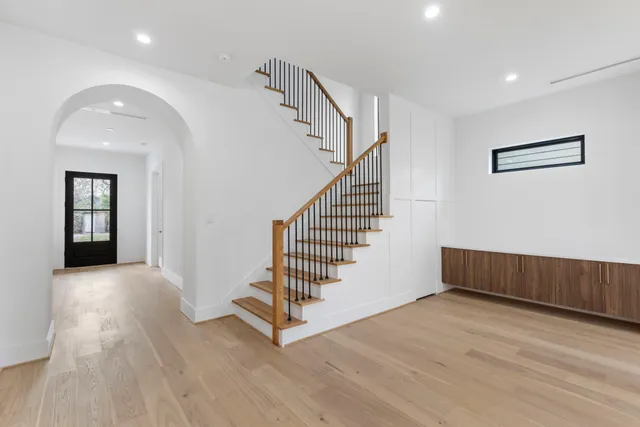 a view of entryway with wooden floor