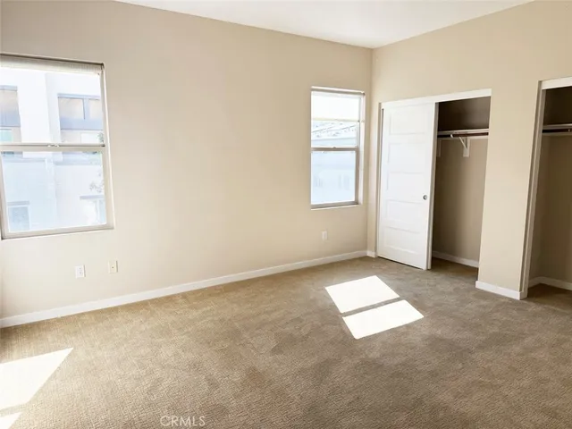 an empty room with windows