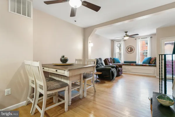 a kitchen with stainless steel appliances granite countertop wooden cabinets a stove a sink and dishwasher