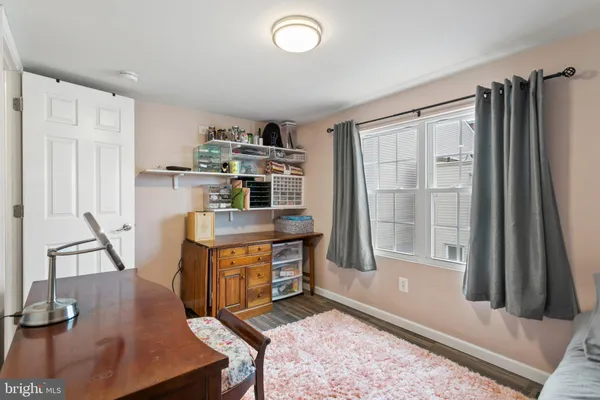 a view of entryway with workspace and stairs