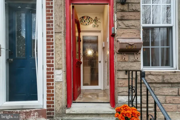 a front view of a house with a door