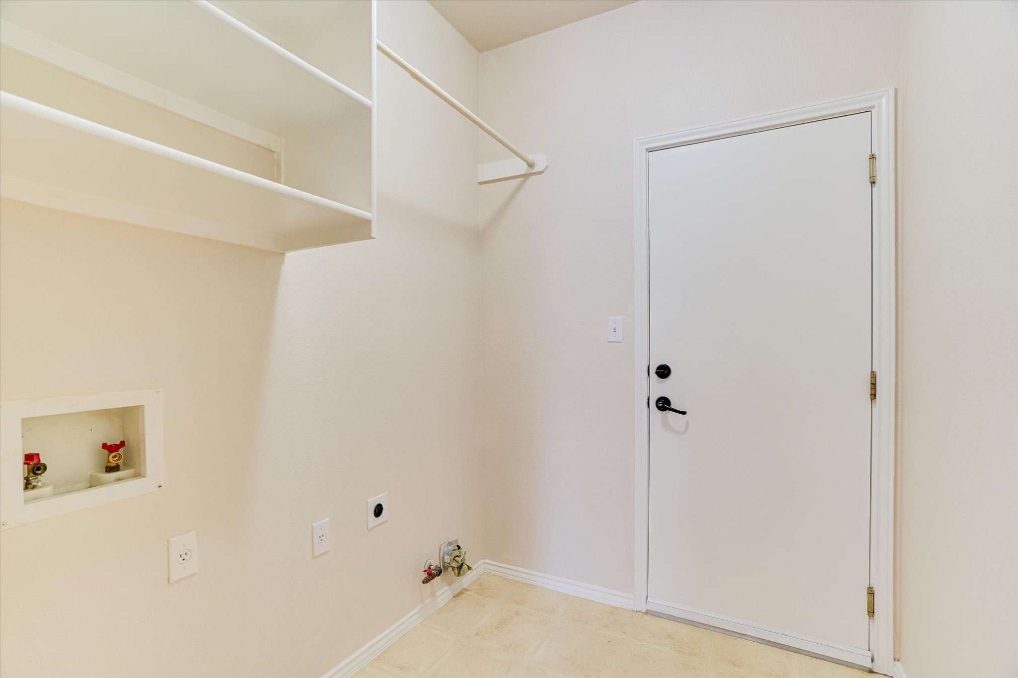 2207 Clover Ridge Drive Cedar Park, TX 78613 - Photo 22 of 25 Utility room with gas and electric connections