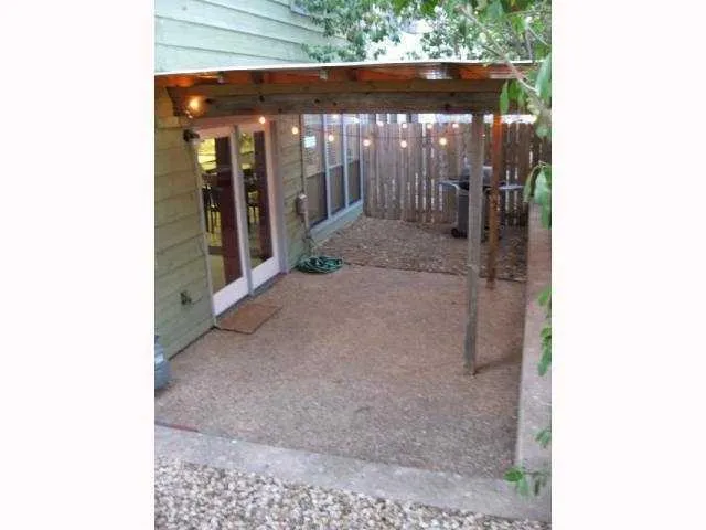 a view of a glass door with glass windows