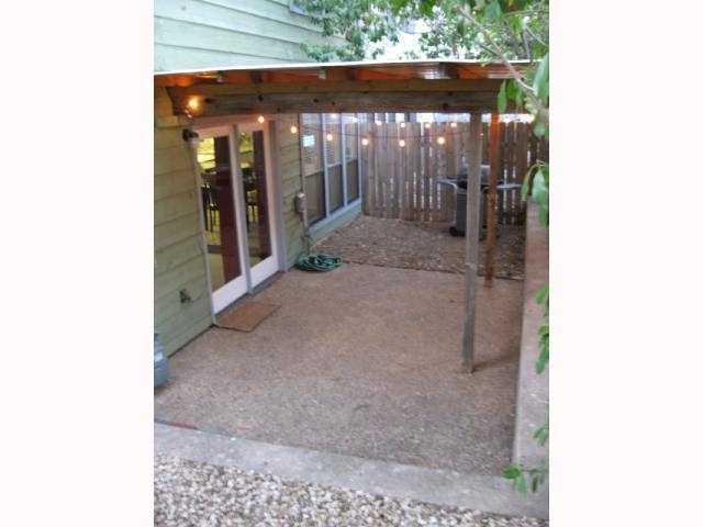 7801 Parliament Place Austin, TX 78759 - Photo 4 of 4 a view of a glass door with glass windows