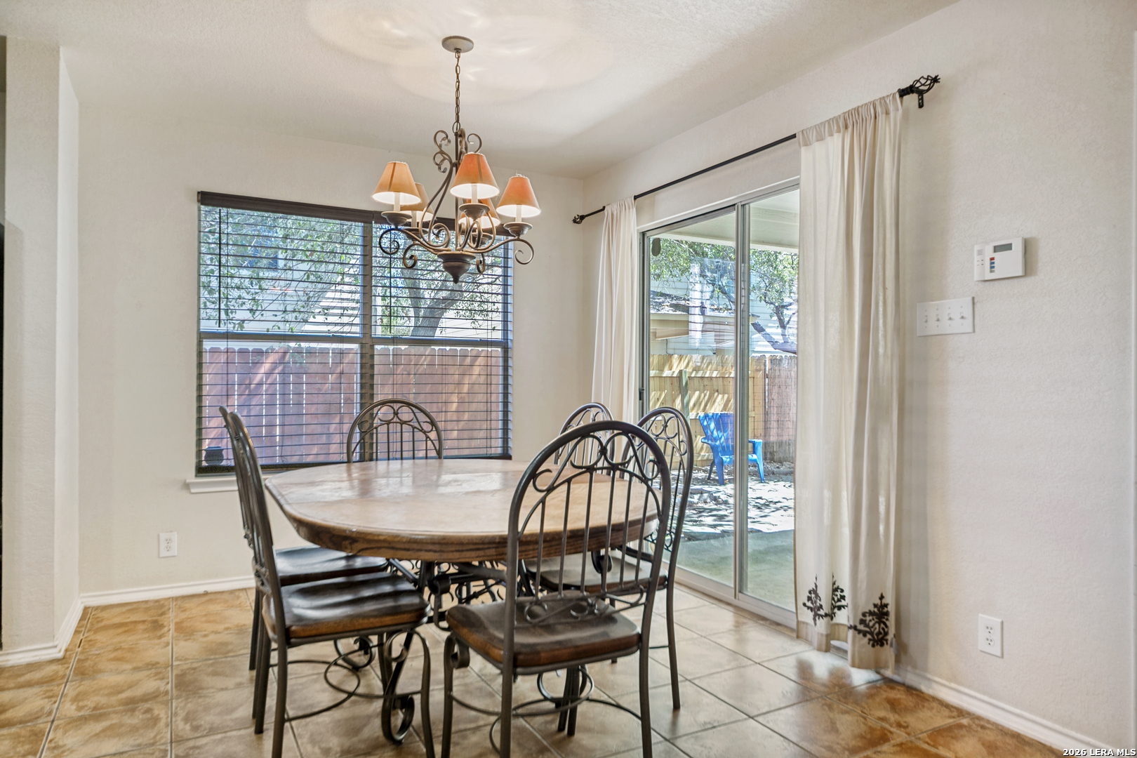127 Hampton Bend Boerne, TX 78006 - Photo 11 of 25 a view of a dining room with furniture window and outside view
