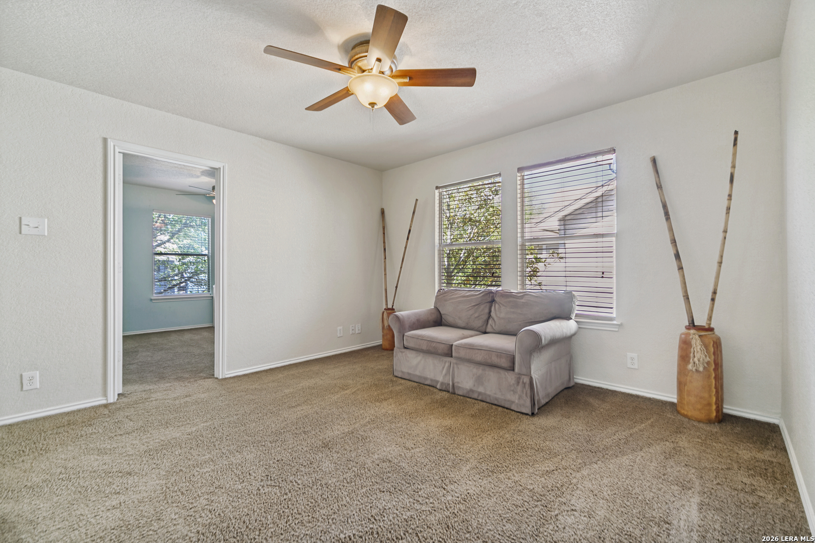 127 Hampton Bend Boerne, TX 78006 - Photo 13 of 25 a living room with furniture and a window