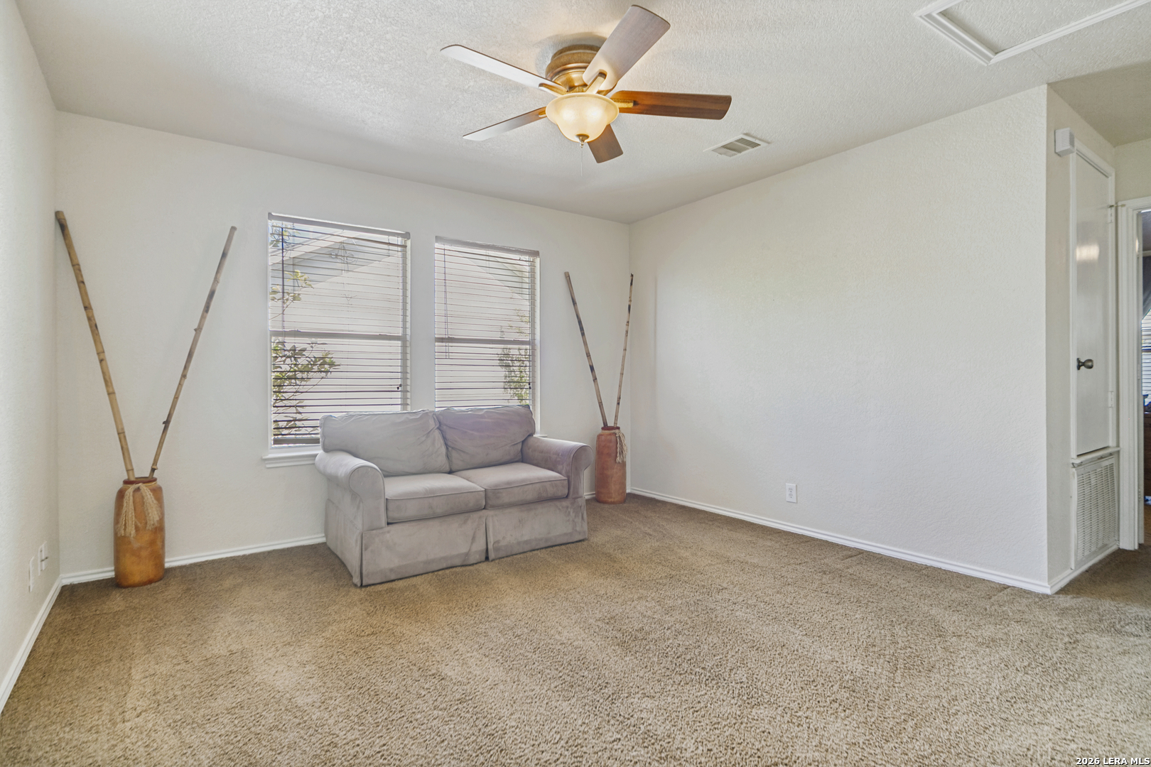 127 Hampton Bend Boerne, TX 78006 - Photo 14 of 25 a living room with furniture and a window