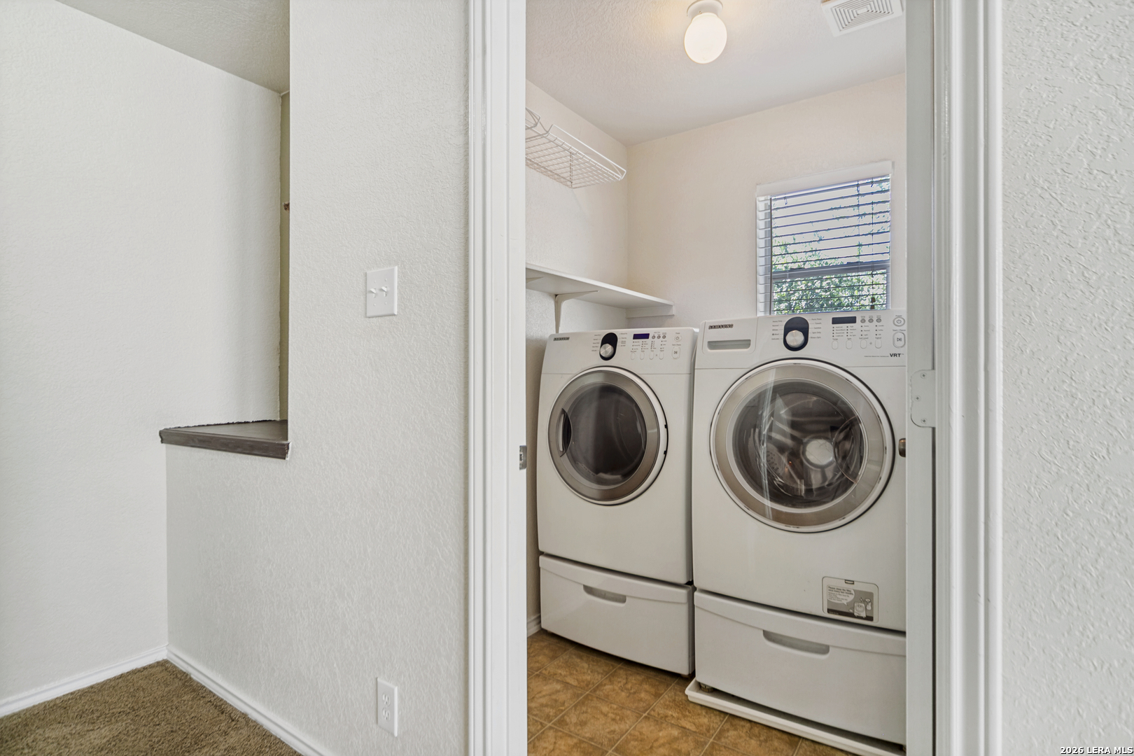 127 Hampton Bend Boerne, TX 78006 - Photo 21 of 25 a utility room with dryer and washer
