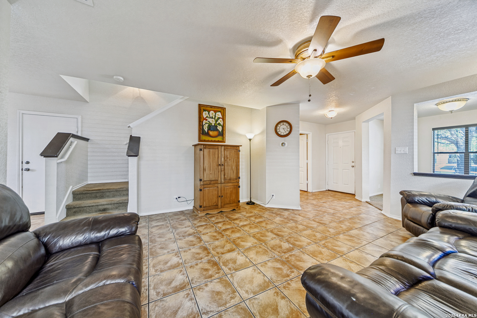 127 Hampton Bend Boerne, TX 78006 - Photo 5 of 25 a living room with furniture and a ceiling fan