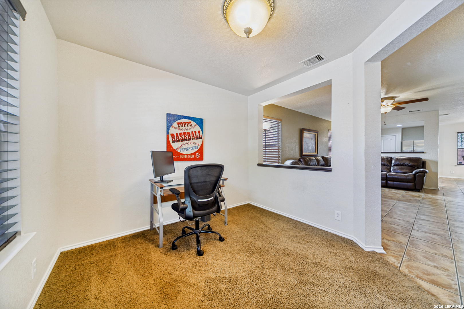 127 Hampton Bend Boerne, TX 78006 - Photo 7 of 25 a workspace with furniture and a mirror