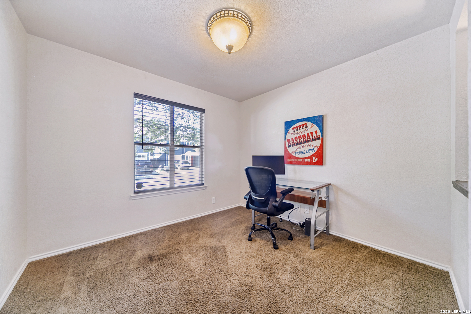 127 Hampton Bend Boerne, TX 78006 - Photo 8 of 25 a view of a workspace with furniture and a window