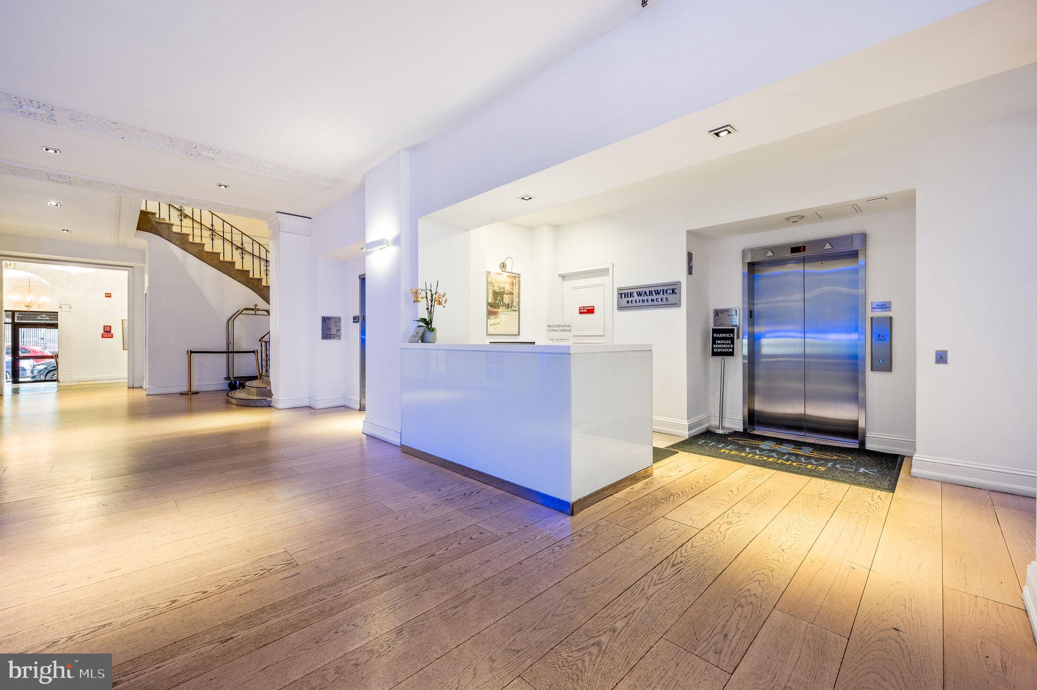 1701 Locust Street, Unit 1607 Philadelphia, PA 19103 - Photo 18 of 26 a view of a kitchen with a sink and a stove top oven