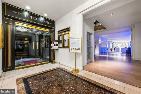a living room with lots of furniture and rug