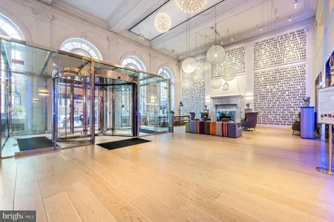 a view of a hall with windows