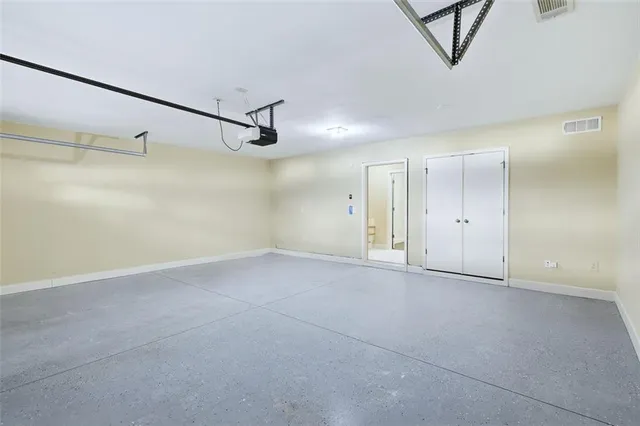 a front view of a house with a garage