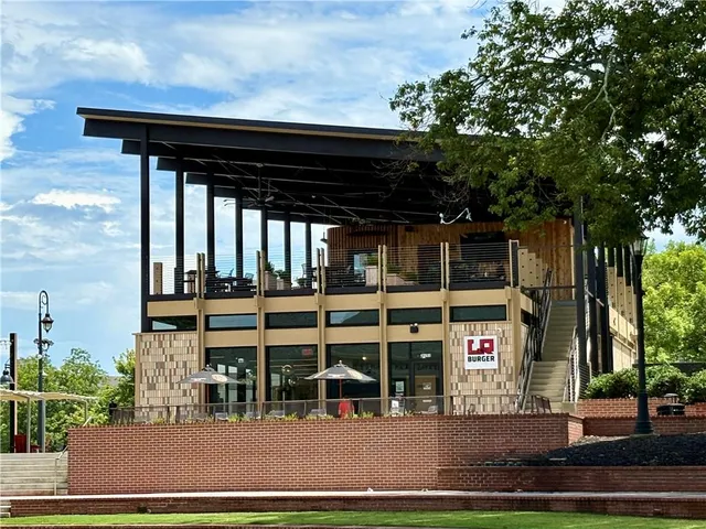 a view of a swimming pool with chairs