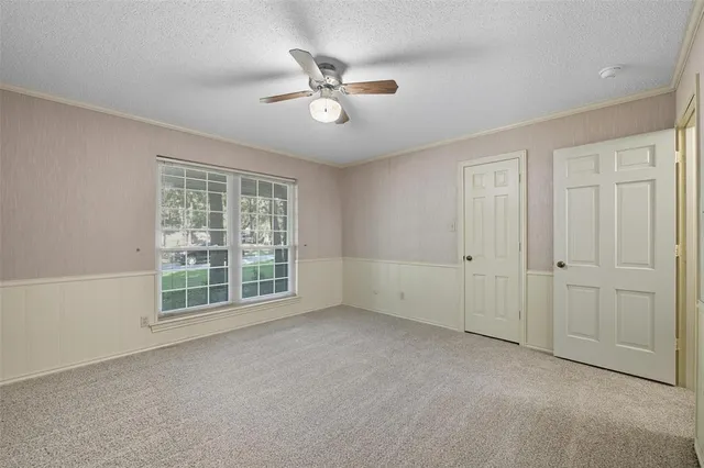 an empty room with a empty space and a window