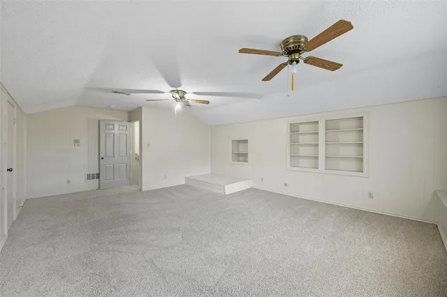 a bathroom with a tub and sink
