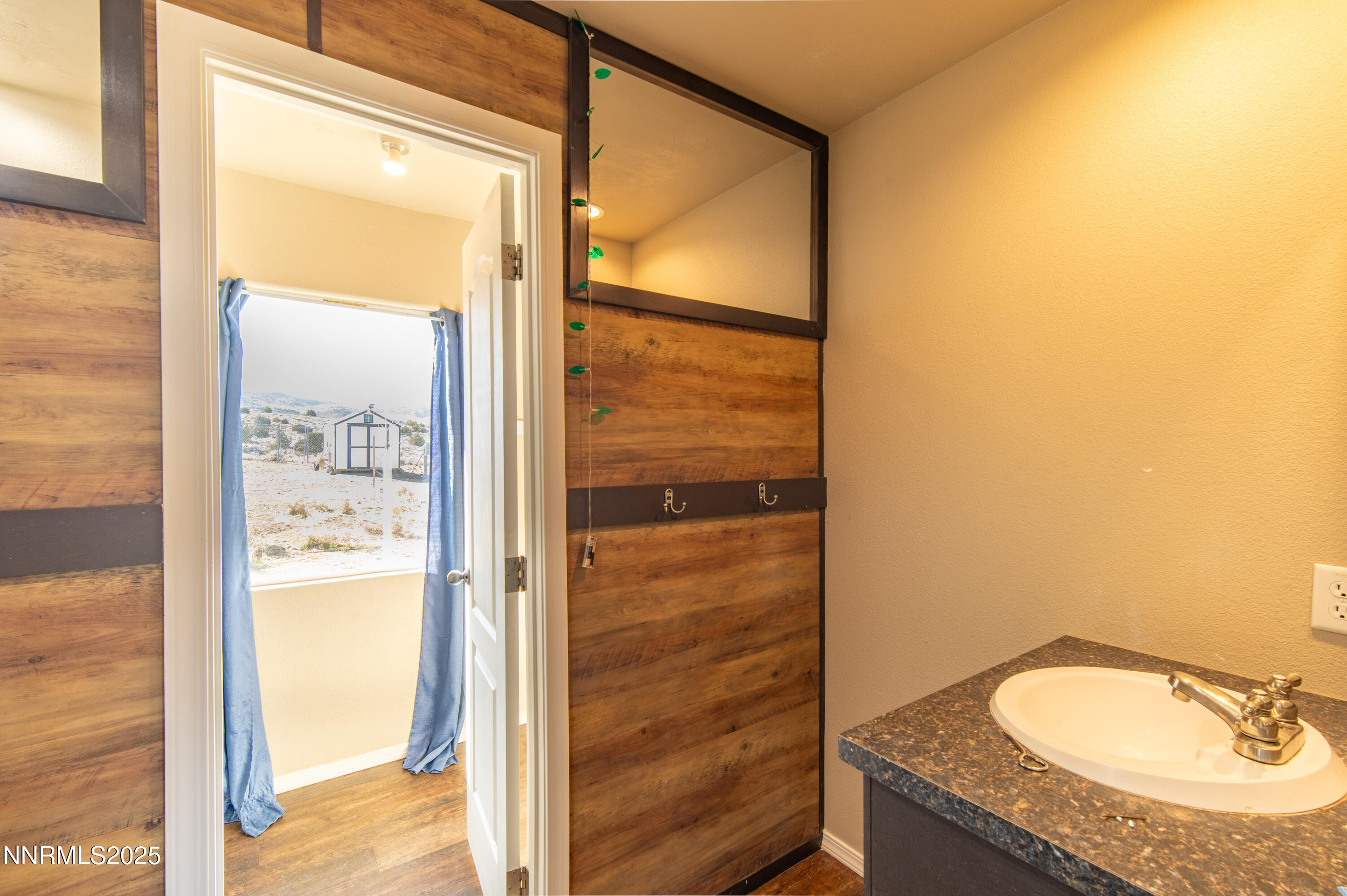 3900 Morning Dove Road Reno, NV 89510 - Photo 18 of 27 a bathroom with a granite countertop shower and a sink