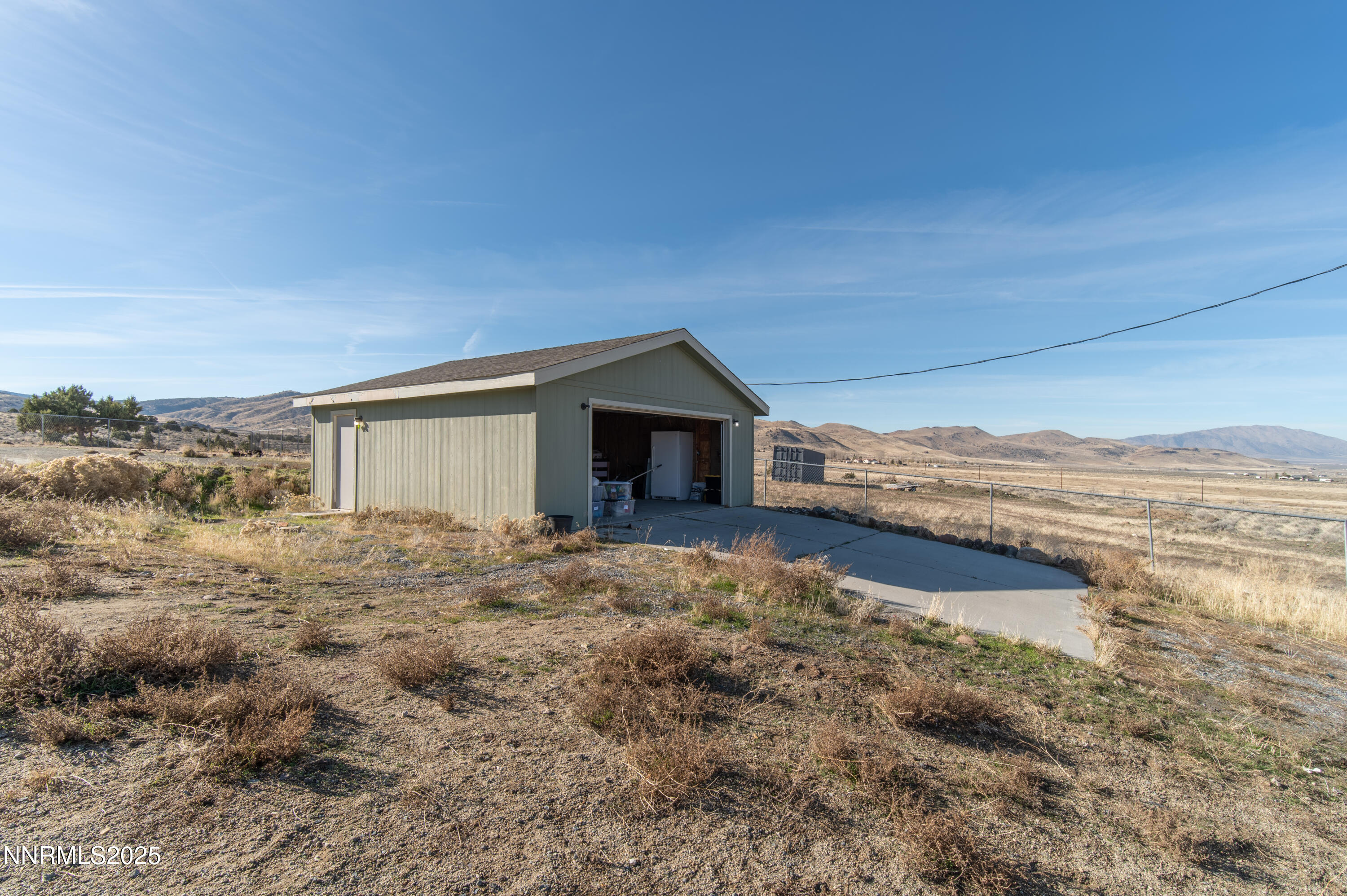 3900 Morning Dove Road Reno, NV 89510 - Photo 22 of 27 a view of a house with a yard