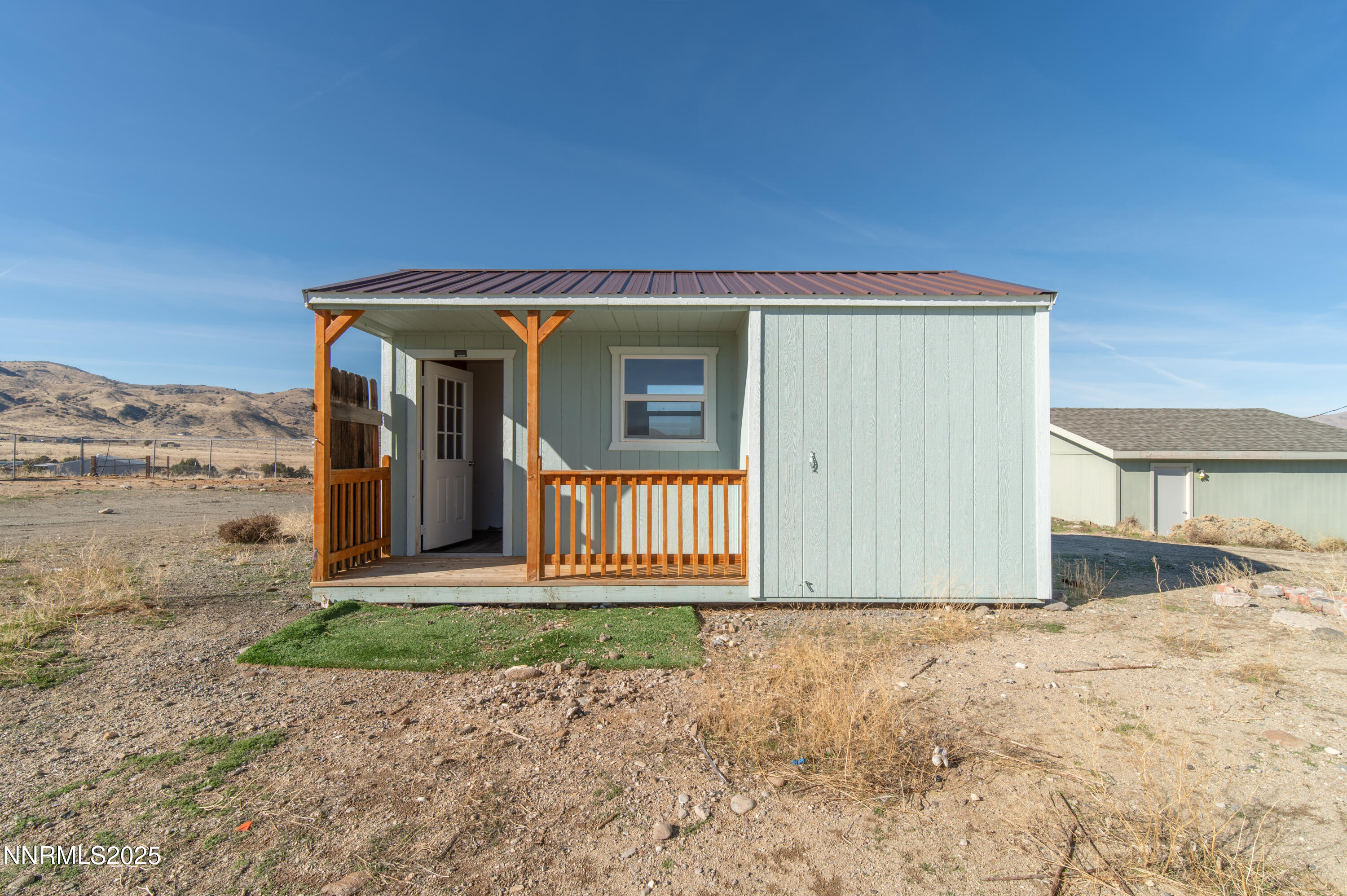 3900 Morning Dove Road Reno, NV 89510 - Photo 23 of 27 a view of a house with a yard