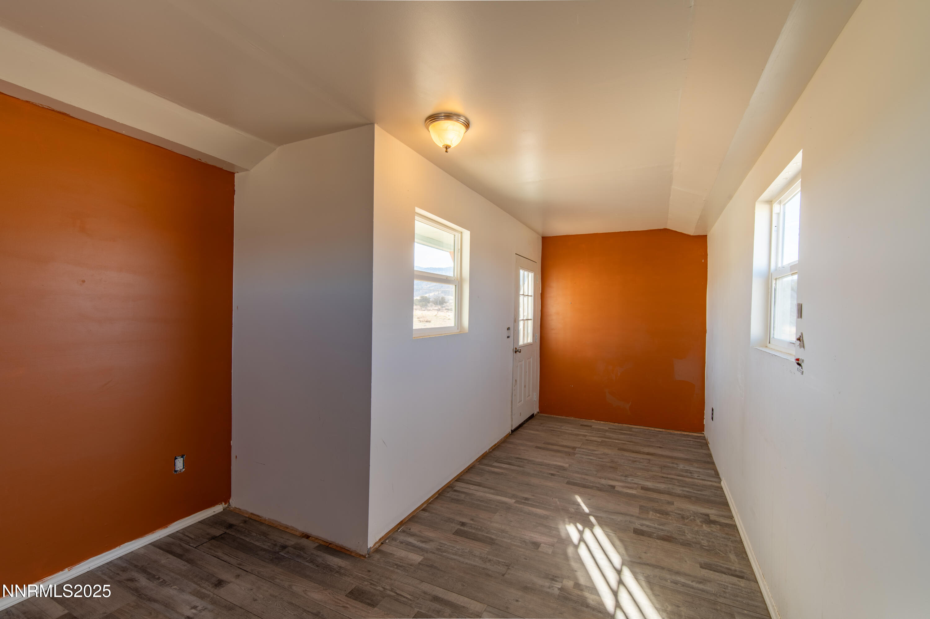 3900 Morning Dove Road Reno, NV 89510 - Photo 25 of 27 a view of hallway with wooden floor
