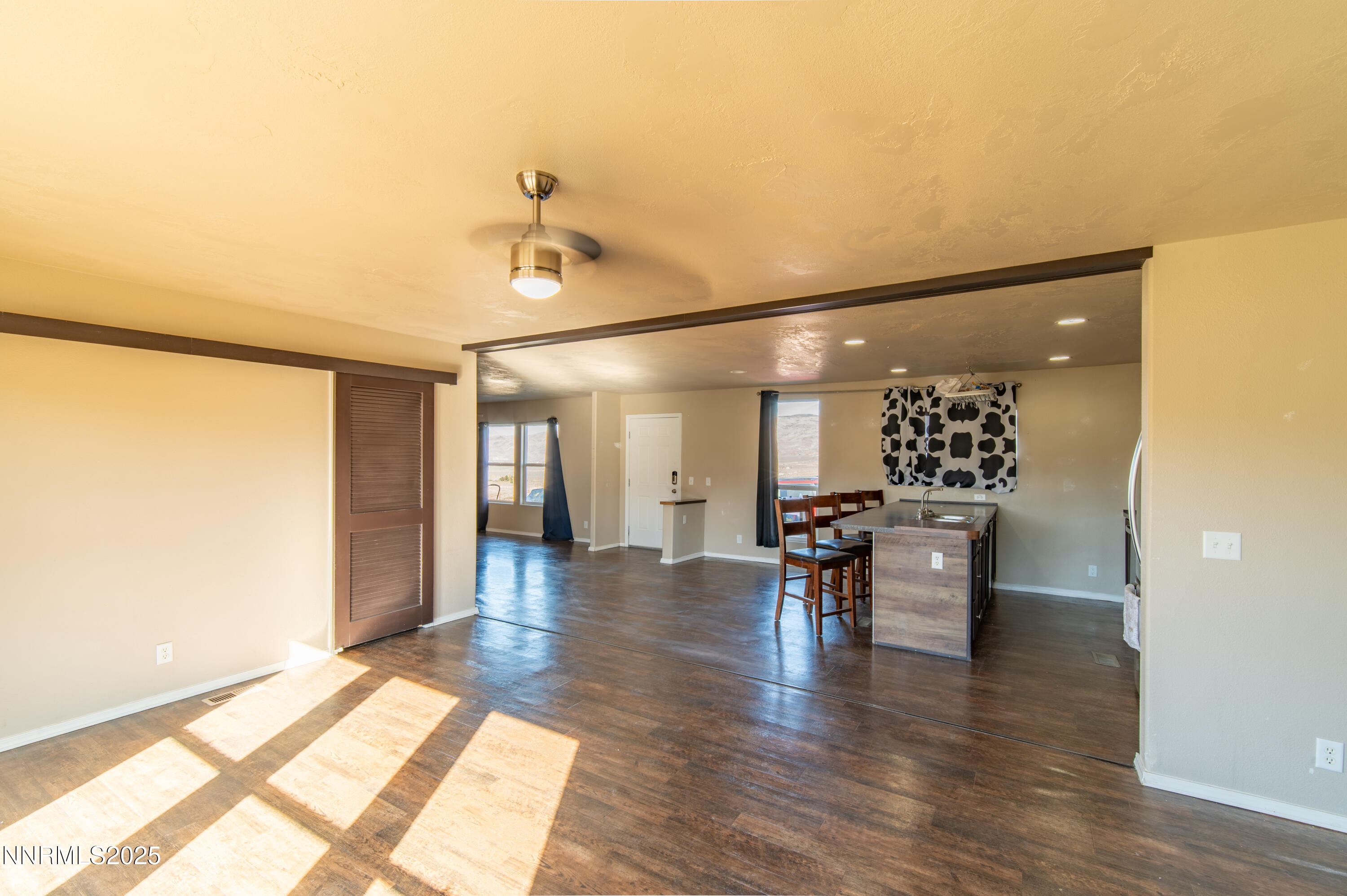 3900 Morning Dove Road Reno, NV 89510 - Photo 6 of 27 a dining room with furniture and wooden floor