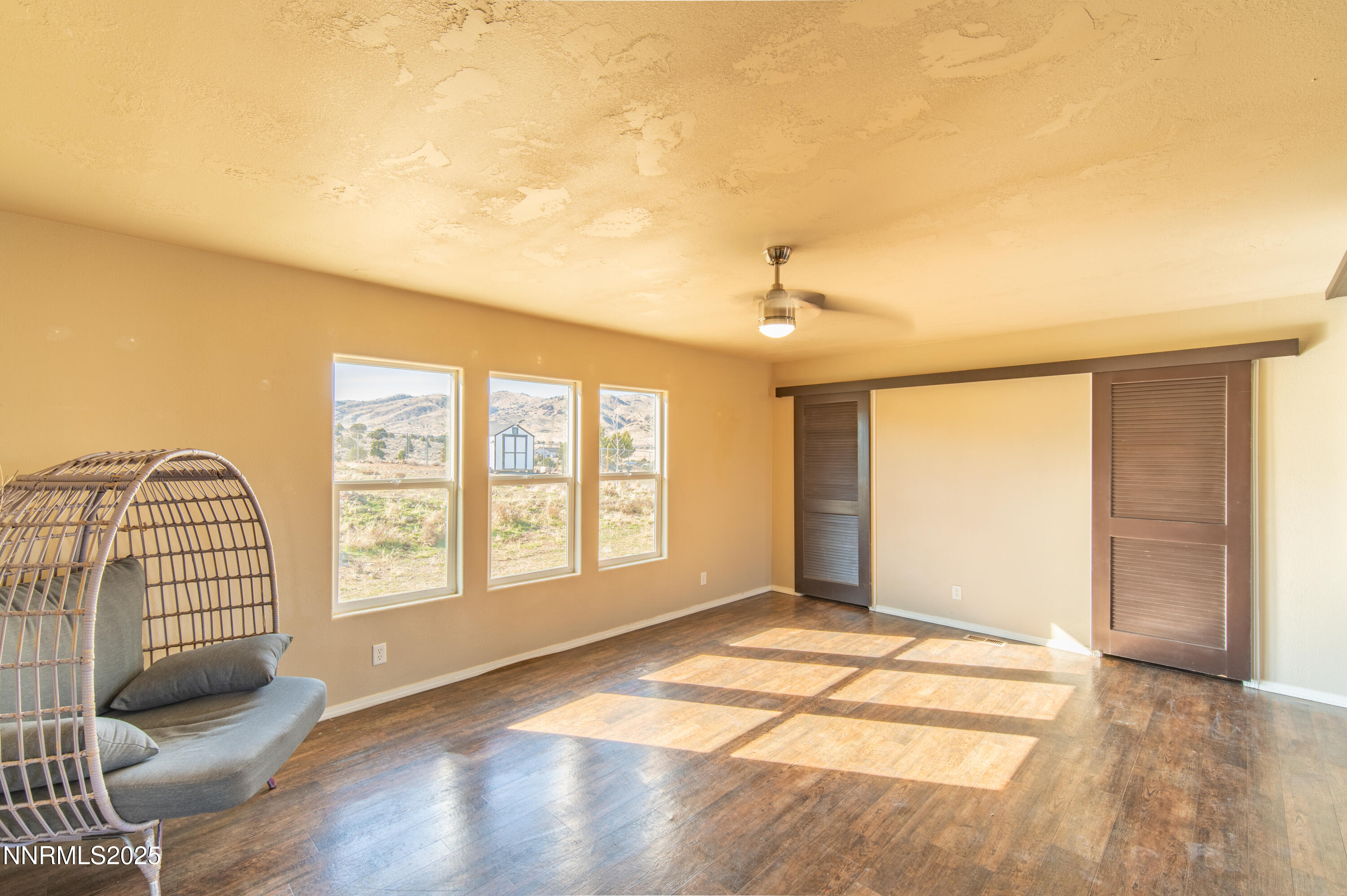 3900 Morning Dove Road Reno, NV 89510 - Photo 8 of 27 an empty room with windows