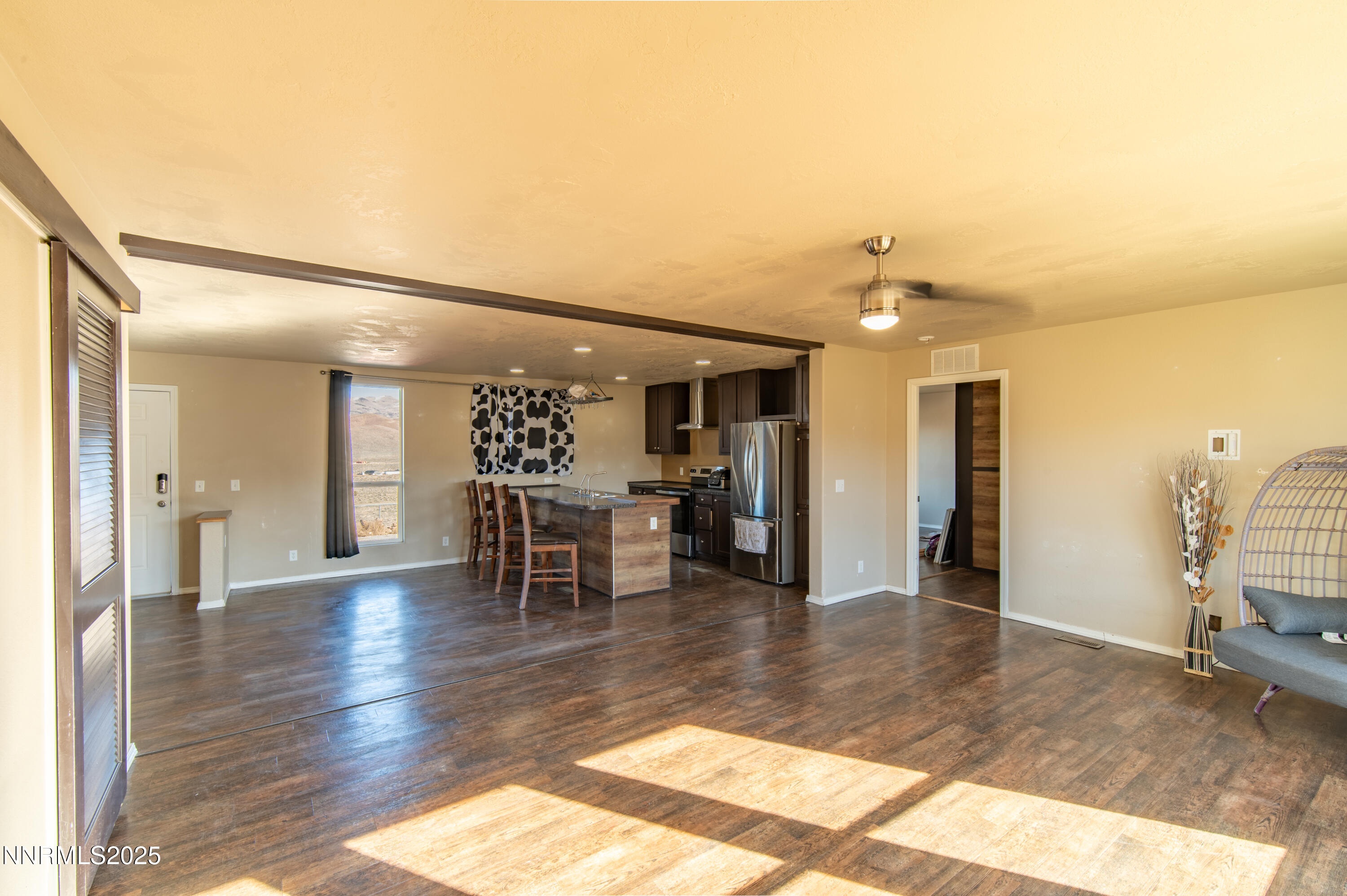 3900 Morning Dove Road Reno, NV 89510 - Photo 9 of 27 a lobby with furniture and wooden floor