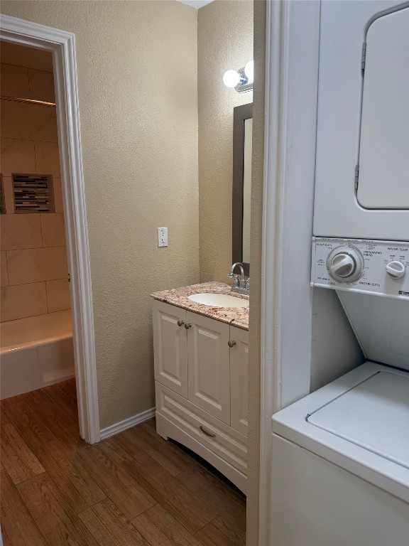 1808 Rio Grande Street, Unit 3 Austin, TX 78701 - Photo 12 of 29 a bathroom with a granite countertop sink toilet and tub